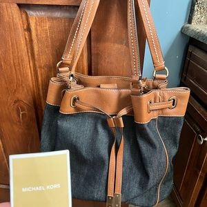 Micheal Kors Marina denim & leather drawstrings tote-like new used once